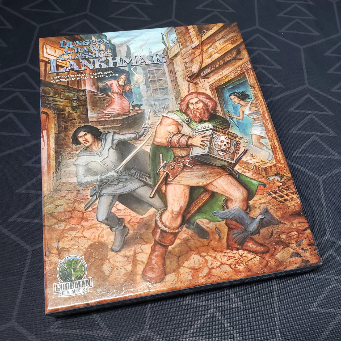 Image shows the front cover of the Lankhmar Box Set for the roleplaying game Dungeon Crawl Classics