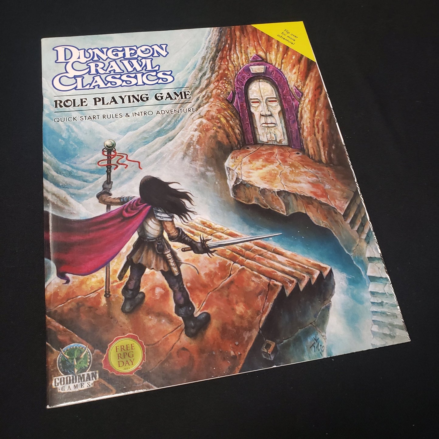 Image shows the front cover of the Quick Start Rules & Intro Adventure book for the roleplaying game Dungeon Crawl Classics