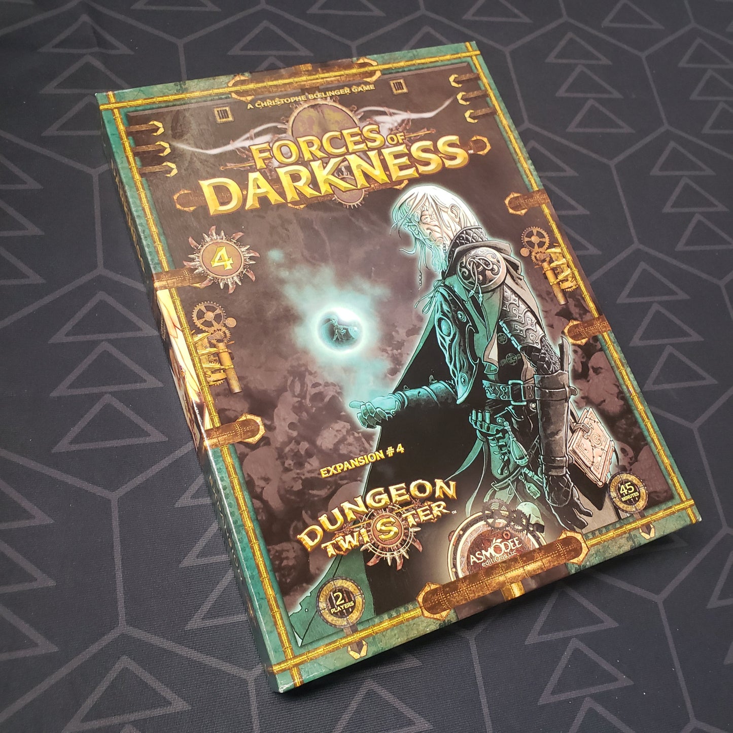 Image shows the front cover of the box of the Forces of Darkness expansion for the board game Dungeon Twister