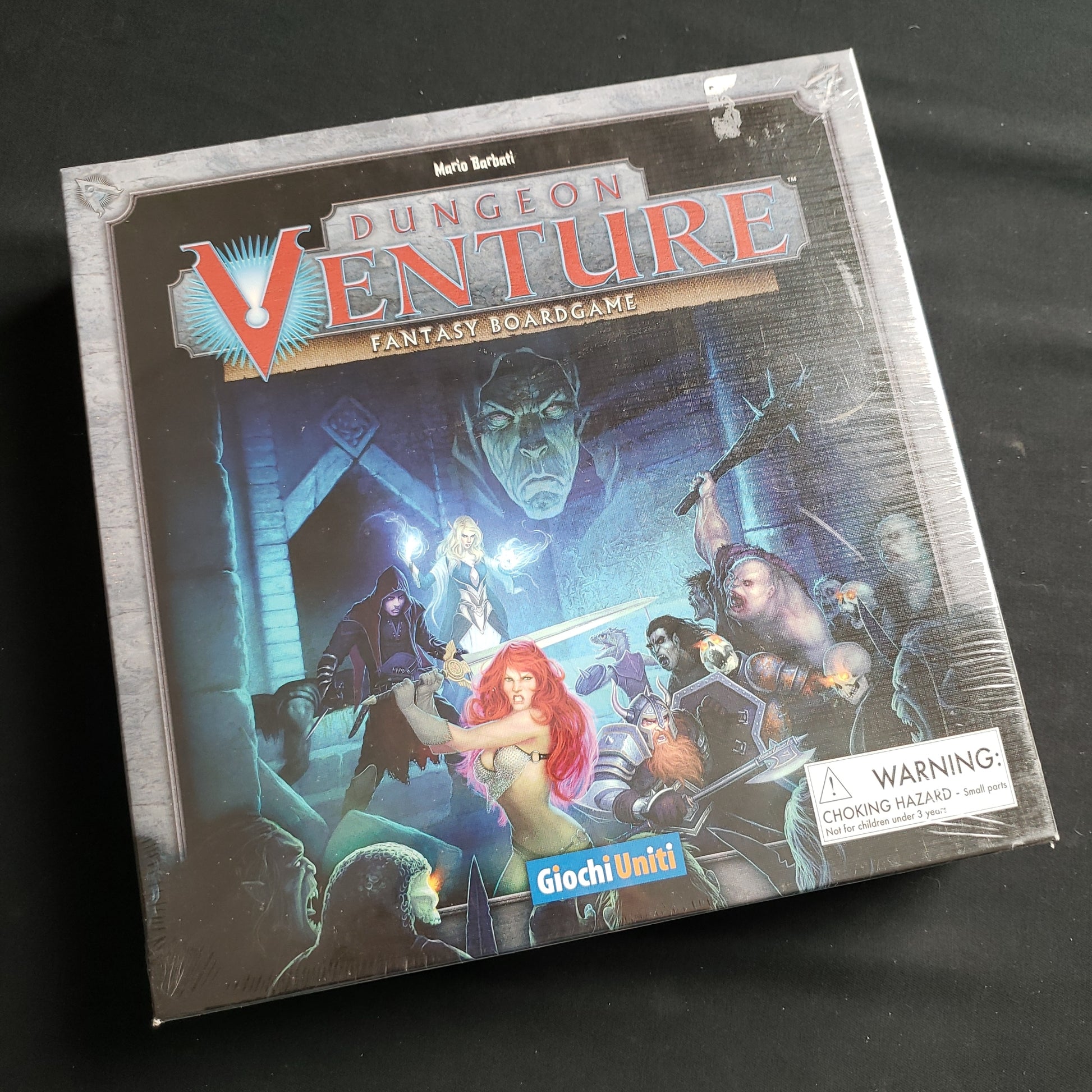 Image shows the front cover of the box of the Dungeon Venture board game