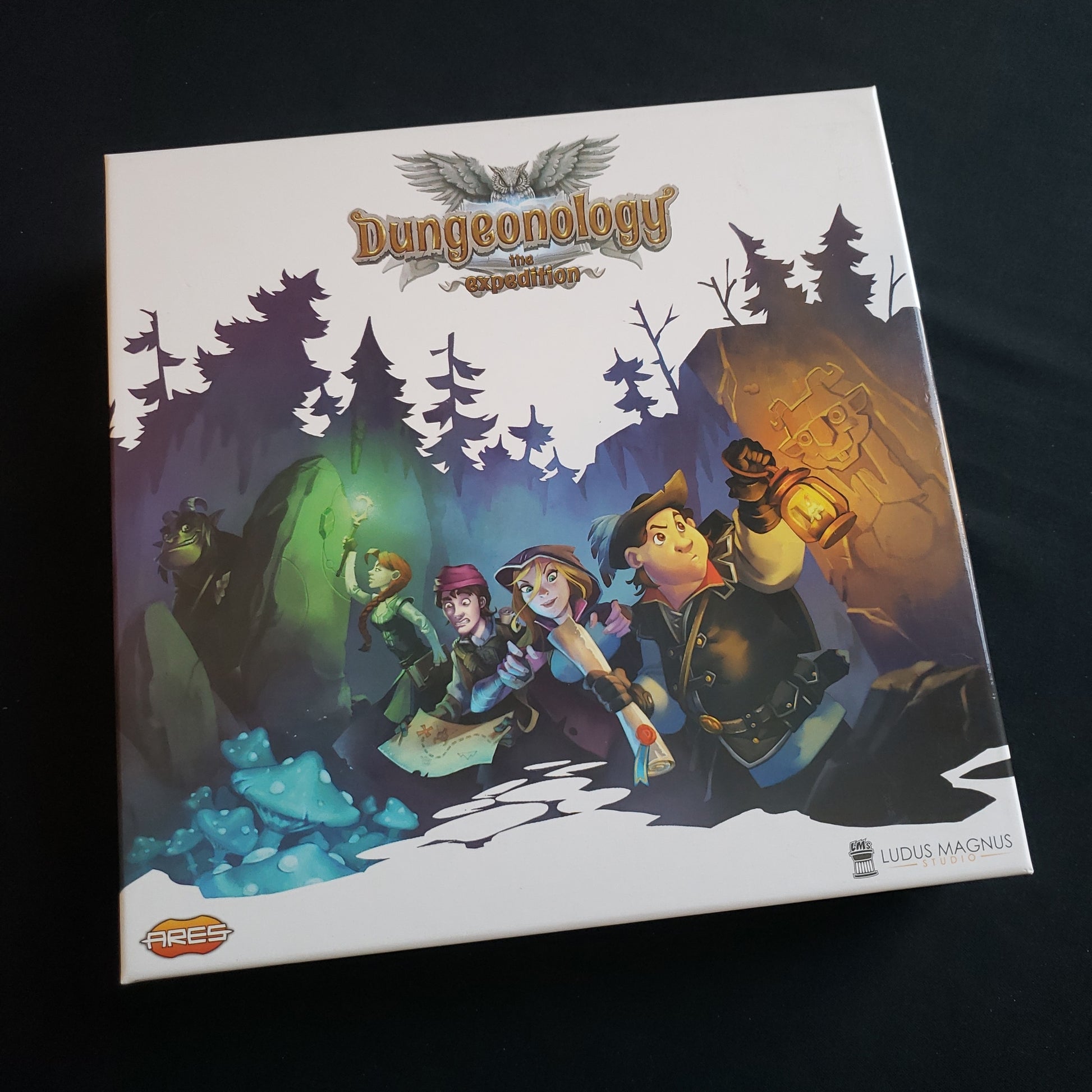 Image shows the front cover of the box of the board game Dungeonology: The Expedition