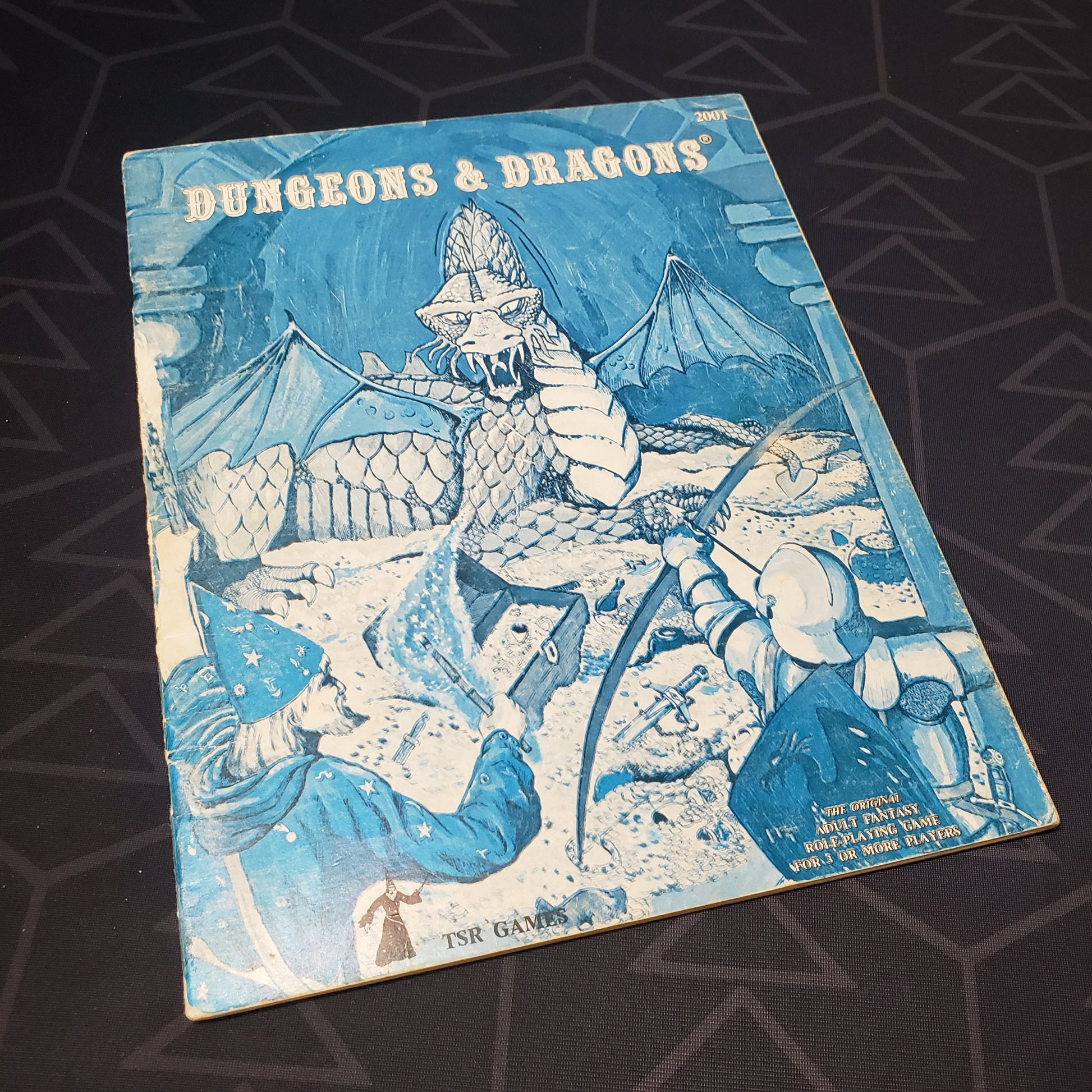 Image shows the front cover of the 1979 Basic Rulebook booklet for the roleplaying game Dungeons & Dragons 1E