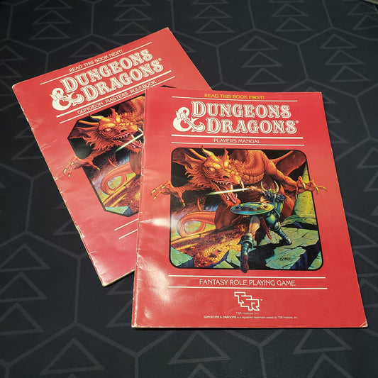 Image shows the front covers of the two booklets that came in the Set 1: Basic Rules box set for the roleplaying game Dungeons & Dragons 1E