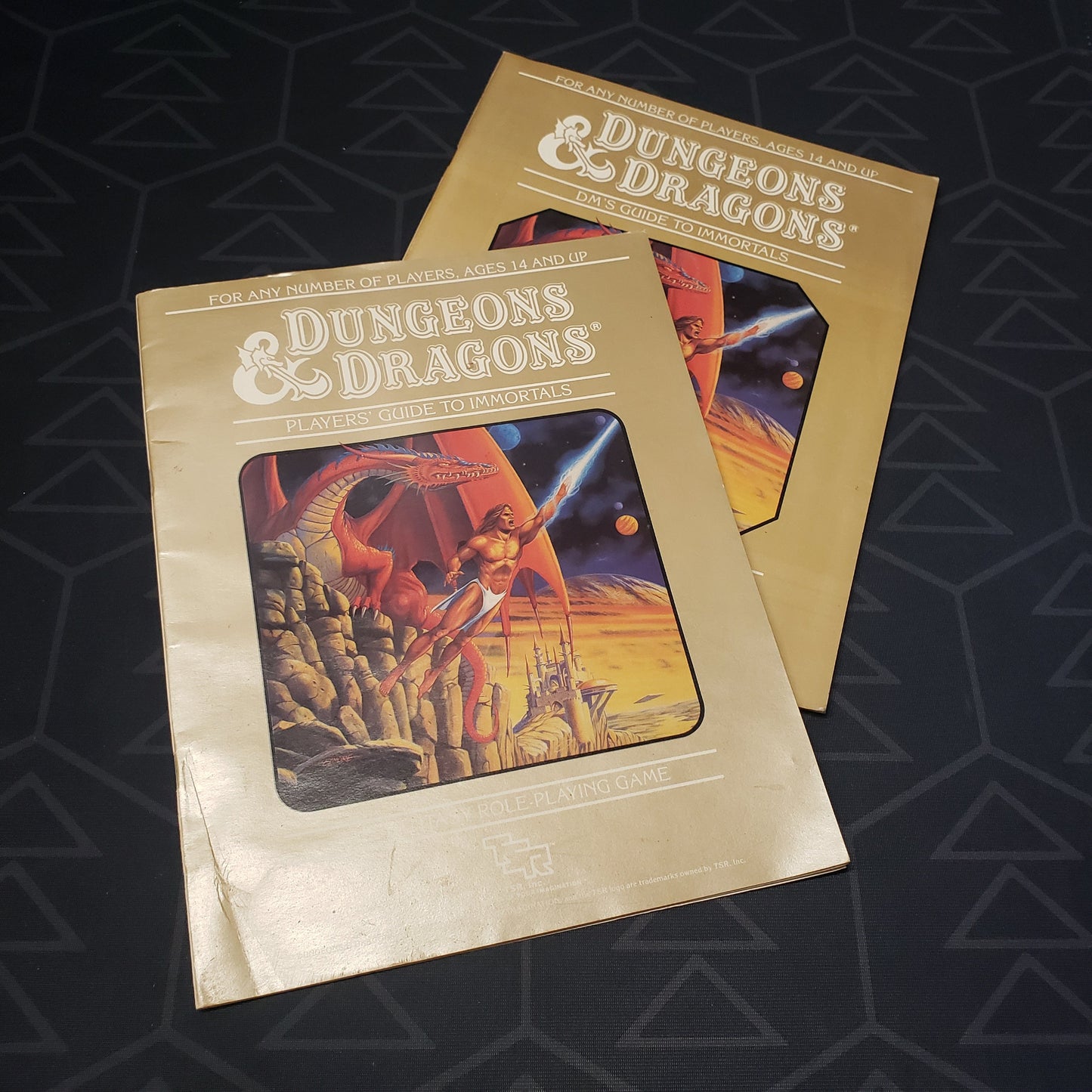 Image shows the front cover of both booklets from the Set 5: Immortals Rules set for the roleplaying game Dungeons & Dragons 1E