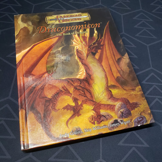 Image shows the front cover of the Draconomicon: The Book of Dragons book for the roleplaying game Dungeons & Dragons: 3.5 Edition