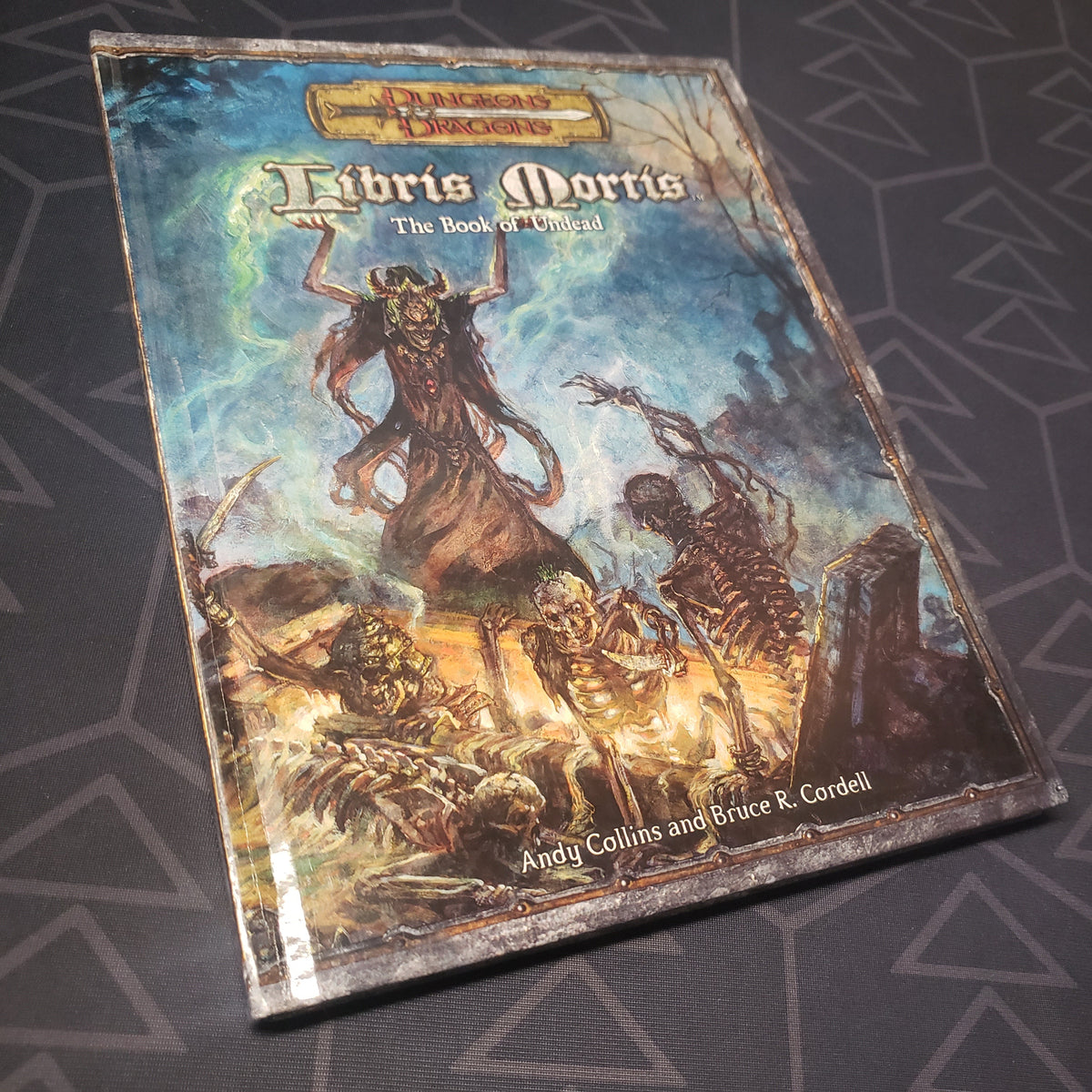 Image shows the front cover of the Libris Mortis: Book of the Undead book for the roleplaying game Dungeons & Dragons 3.5E
