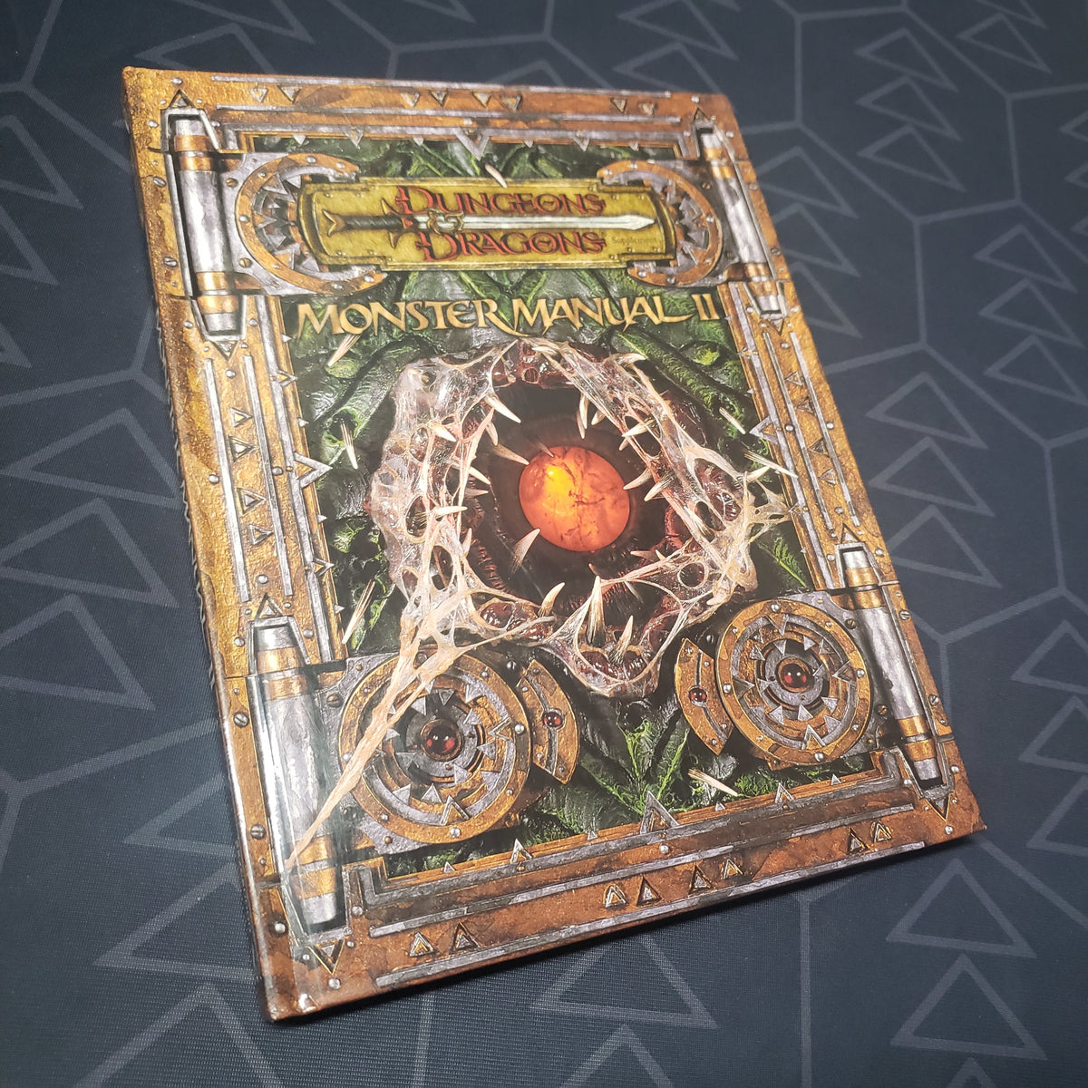 Image shows the front cover of the Monster Manual II book for the roleplaying game Dungeons & Dragons 3.5E