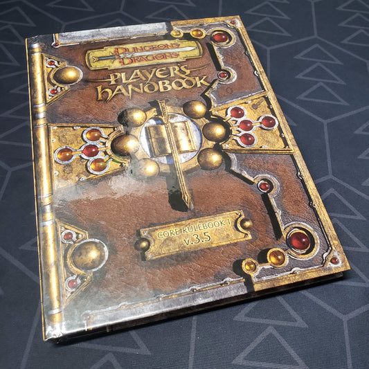 Image shows the front cover of the Player's Handbook for the roleplaying game Dungeons & Dragons: 3.5 Edition