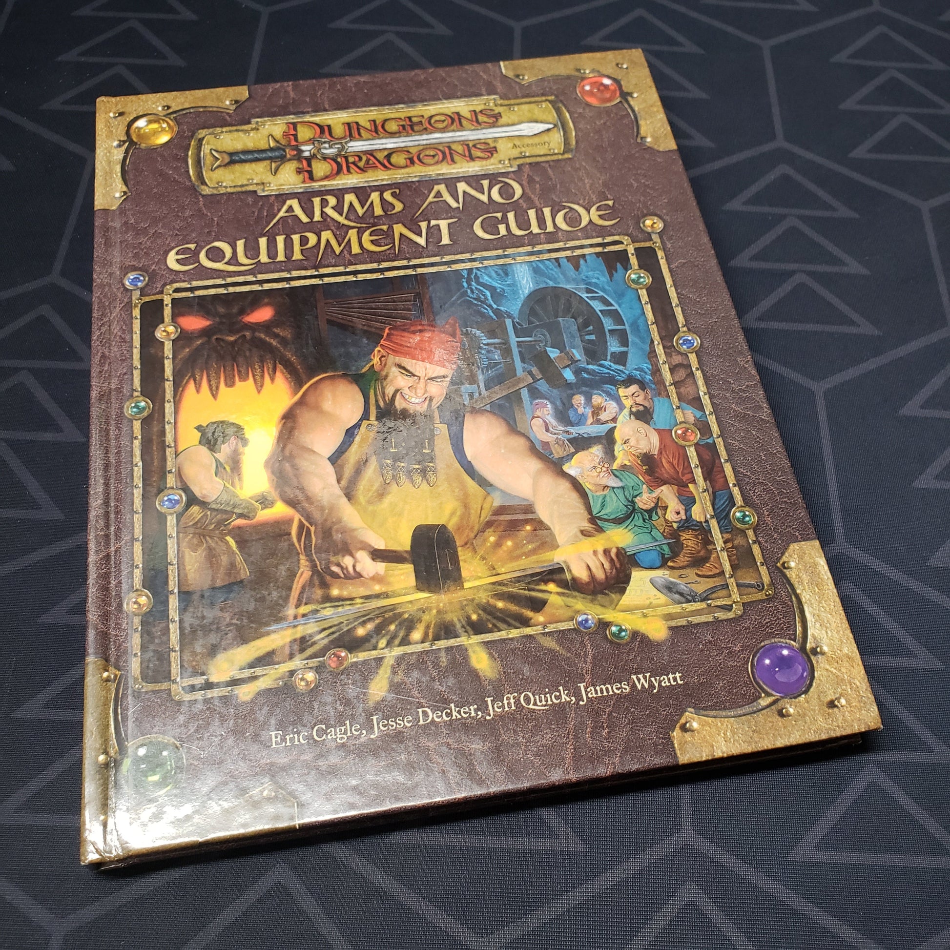 Image shows the front cover of the Arms and Equipment Guide book for the roleplaying game Dungeons & Dragons: Third Edition