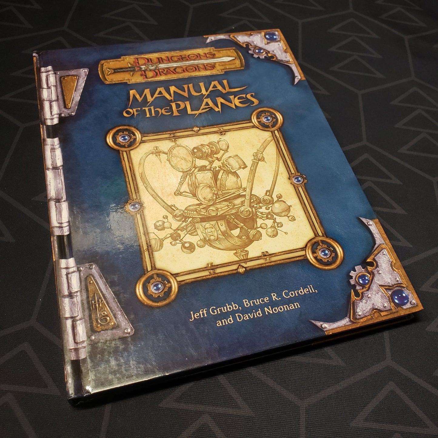 Image shows the front cover of the Manual of the Planes book for the roleplaying game Dungeons & Dragons: Third Edition