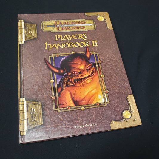 Image shows the front cover of the Player's Handbook II for the roleplaying game Dungeons & Dragons: Third Edition