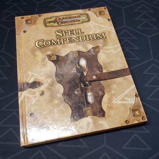 Image shows the front cover of the Spell Compendium book for the roleplaying game Dungeons & Dragons: 3.5 Edition