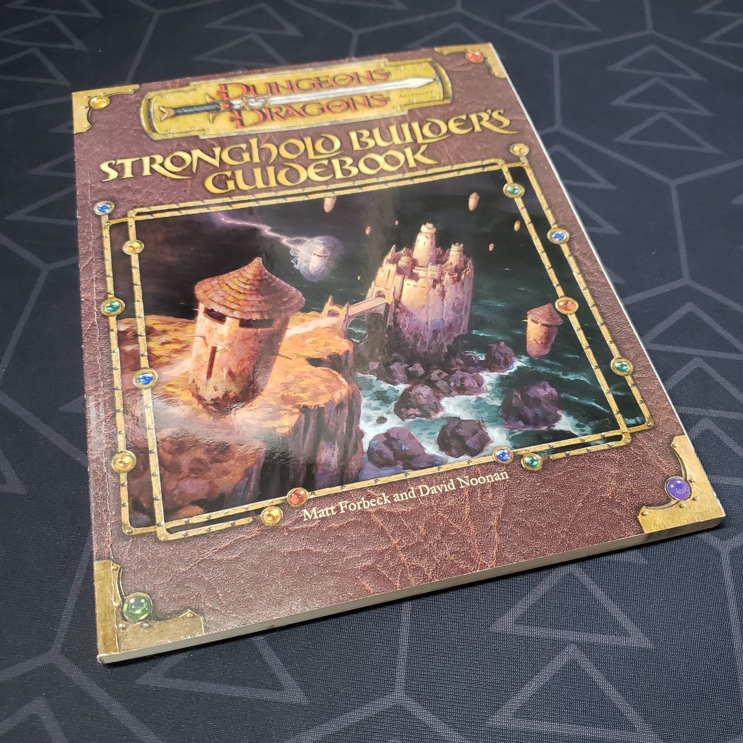 Image shows the front cover of the Stronghold Builder's Guidebook for the roleplaying game Dungeons & Dragons: Third Edition