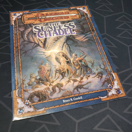 Image shows the front cover of the Sunless Citadel book for the roleplaying game Dungeons & Dragons: Third Edition