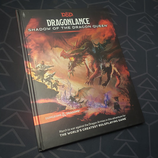 Image shows the front cover of the deluxe foil hardcover Dragonlance: Shadow of the Dragon Queen book for the roleplaying game Dungeons & Dragons 5E