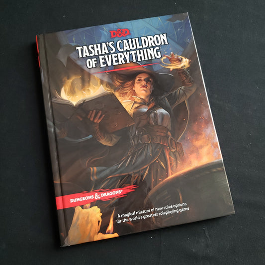 Image shows the front cover of the Tasha's Cauldron of Everything book for the Dungeons & Dragons roleplaying game