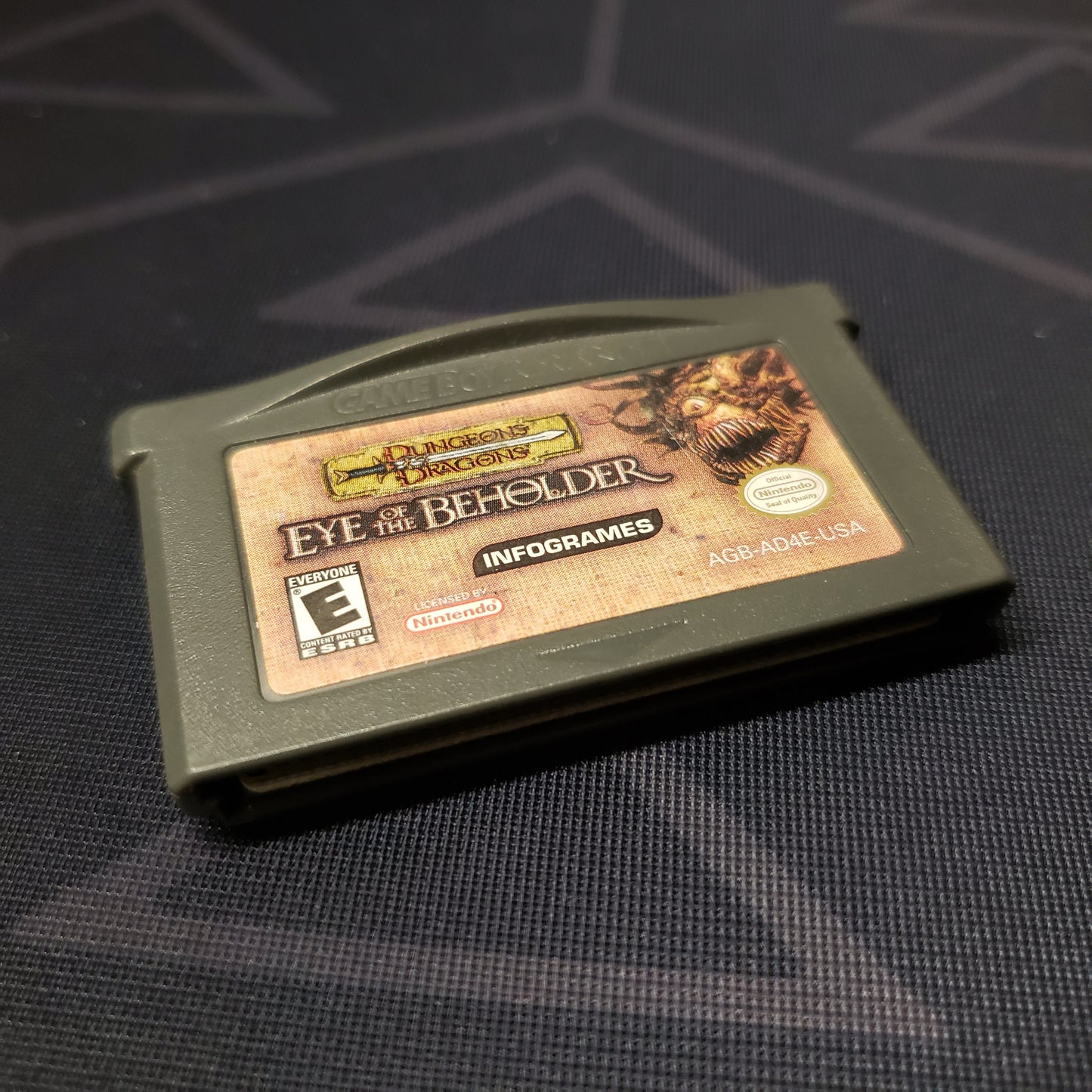 Image shows the front of the cartridge for the video game Dungeons & Dragons: Eye of the Beholder for Nintendo Game Boy Advance