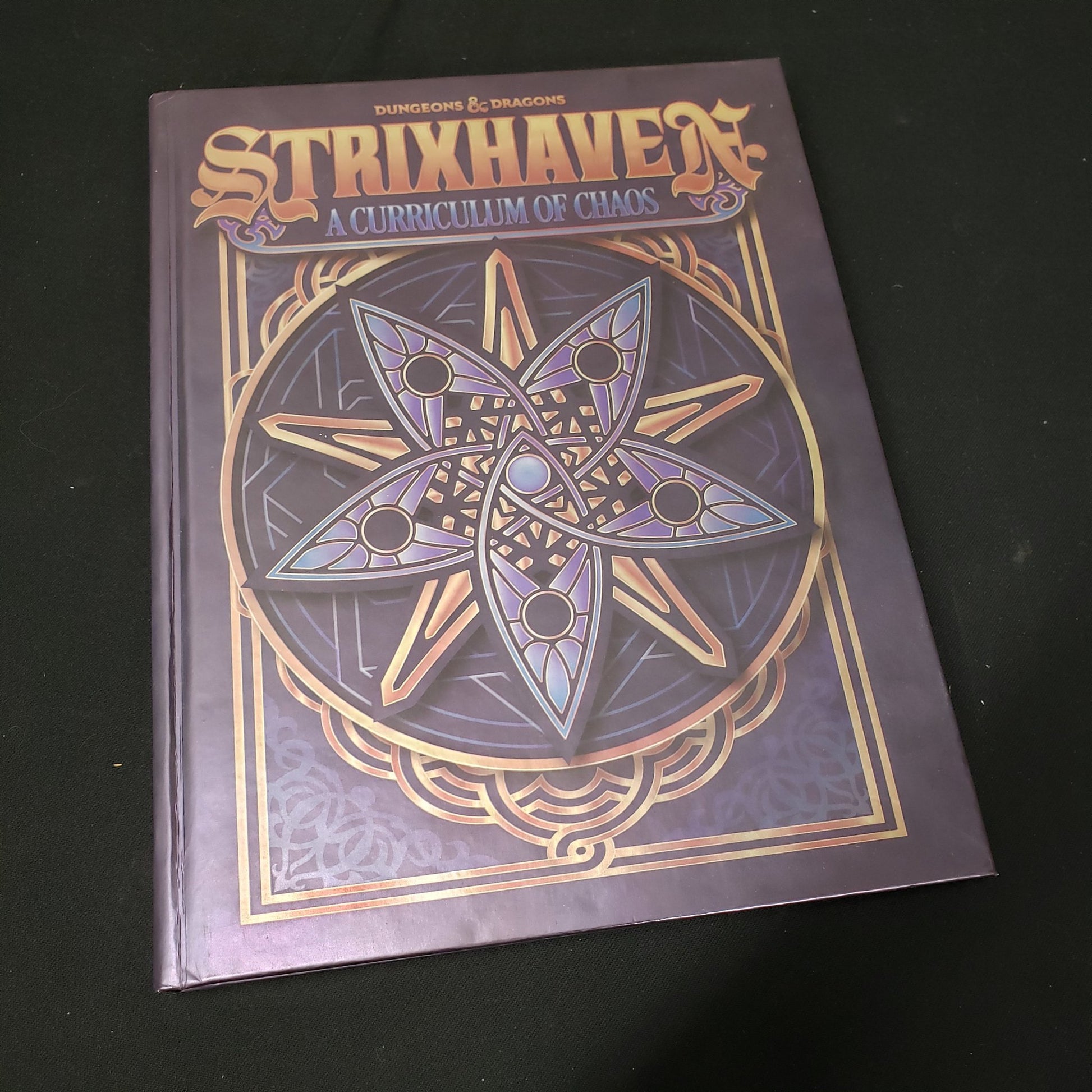 Image shows the front cover of the Strixhaven: A Curriculum of Chaos book for the roleplaying game Dungeons & Dragons: Fifth Edition