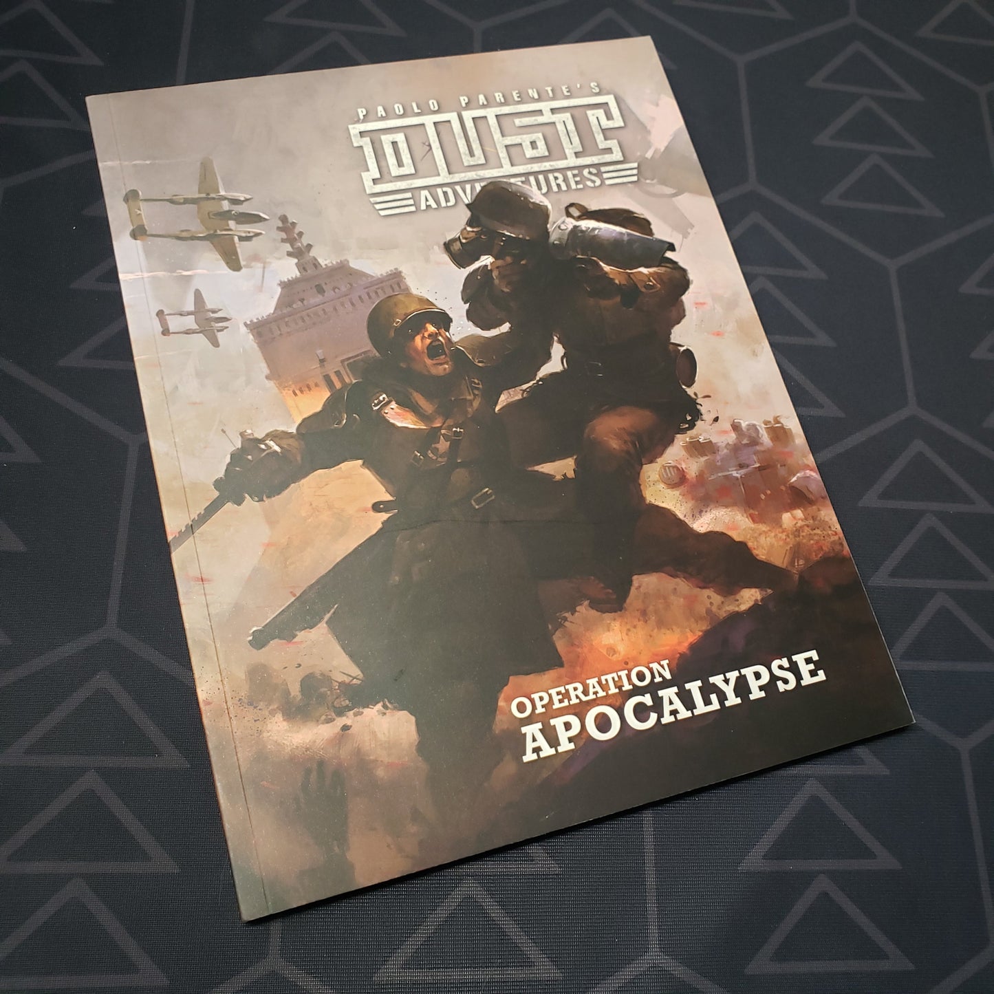 Image shows the front cover of the Operation Apocalypse book for the roleplaying game DUST Adventures