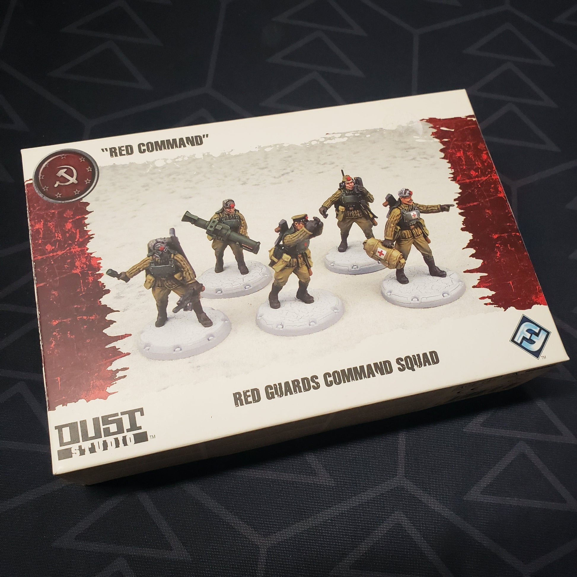 Image shows the front cover of the box of the Red Guards Command Squad: "Red Command" pack for the miniatures game Dust Tactics