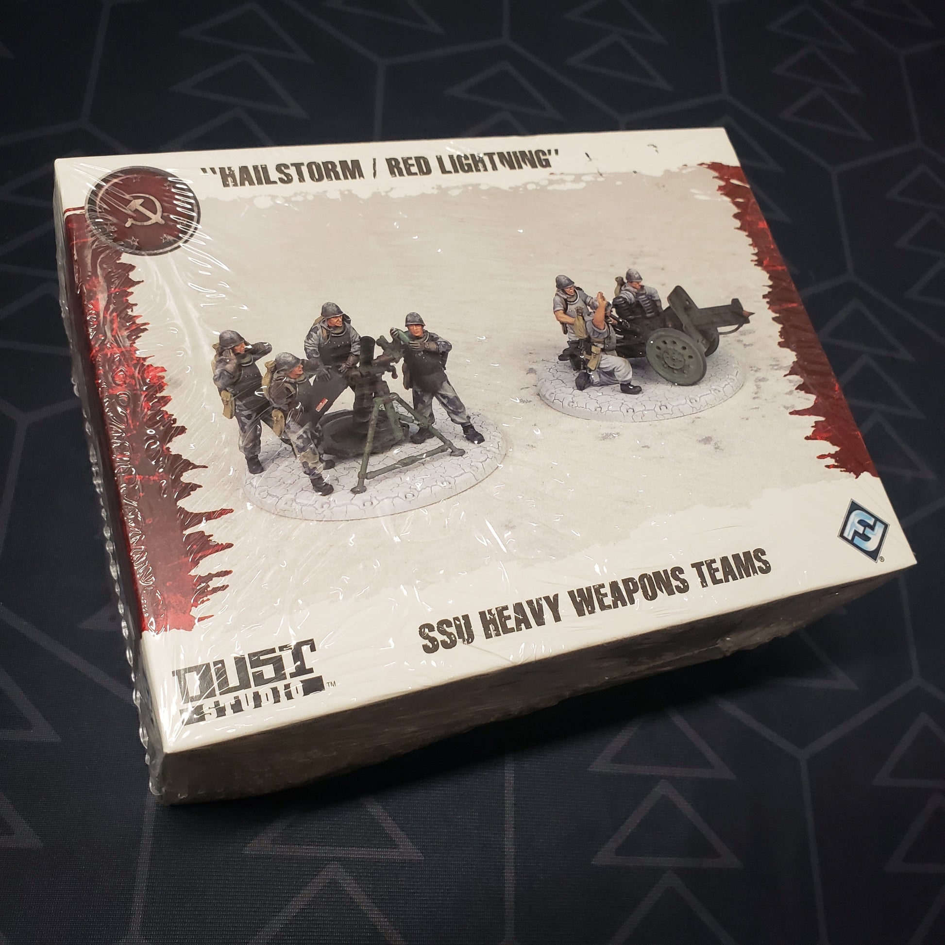 Image shows the front cover of the box of the SSU Heavy Weapons Teams: "Hailstorm / Red Lightning" pack for the miniatures game Dust Tactics