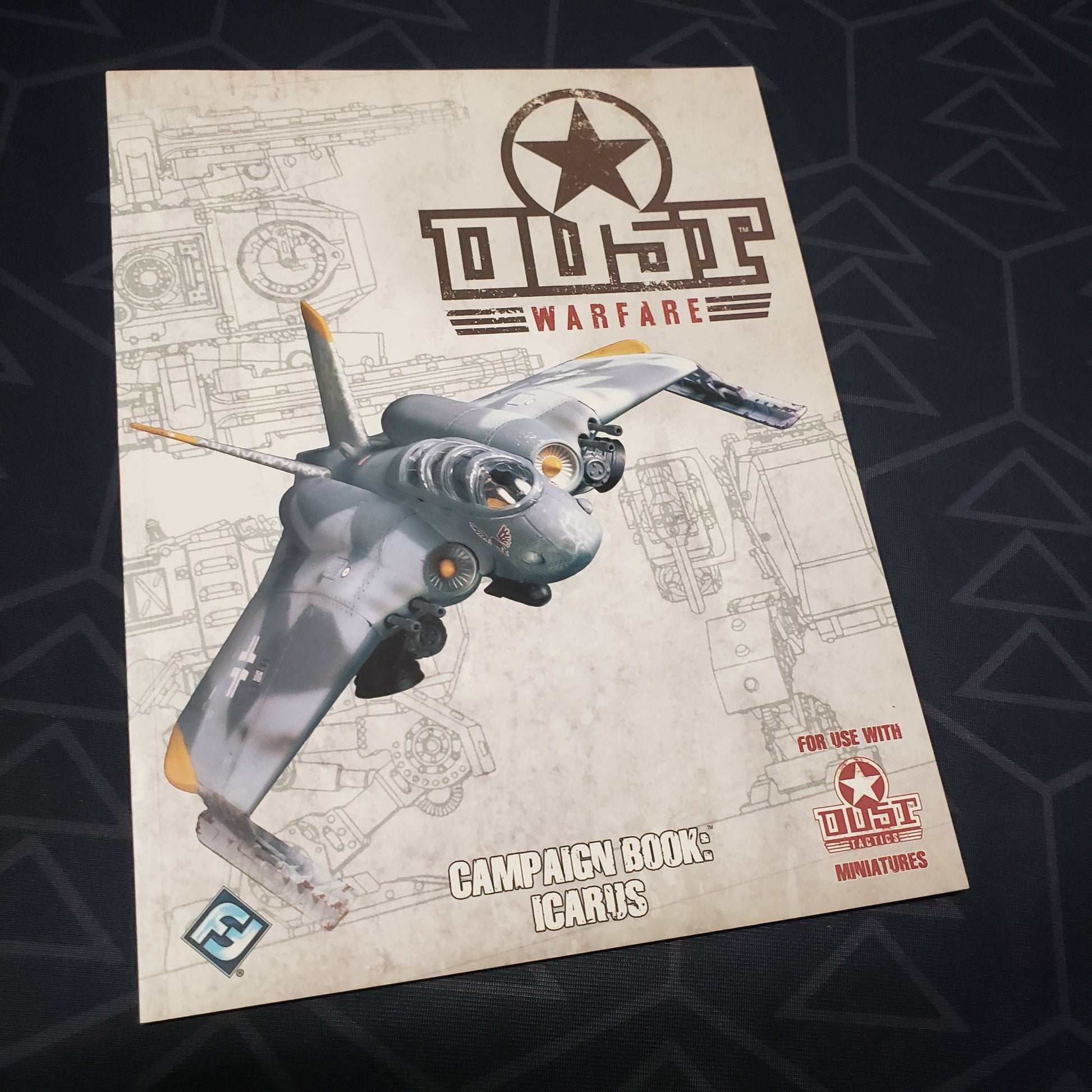 Image shows the front cover of the Campaign Book: Icarus book for the miniatures game Dust Warfare