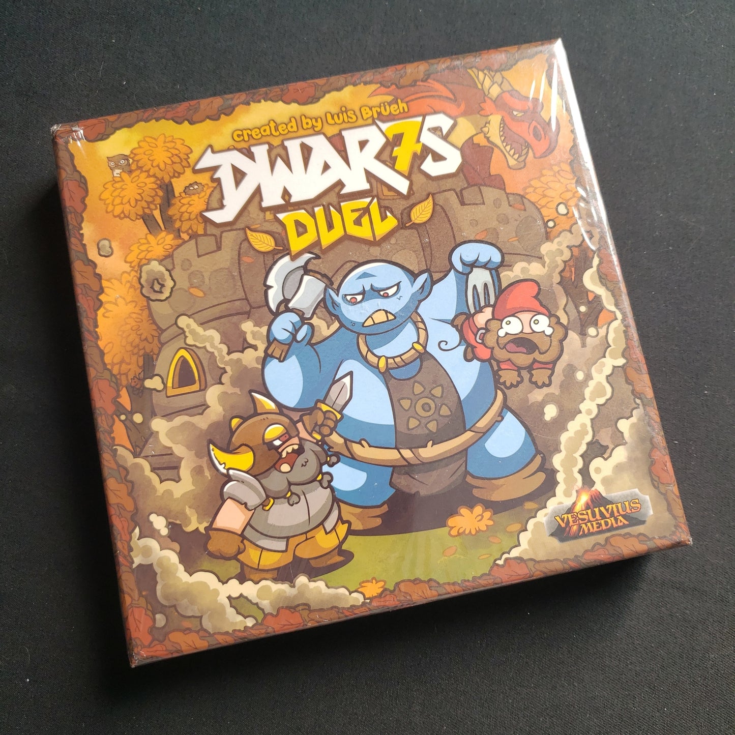 Image shows the front cover of the box of the Dwar7s Duel board game