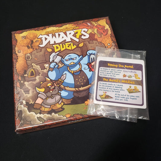 Image shows the front cover of the box of the Dwar7s Duel board game with a bagged promo pack of cards on top of it