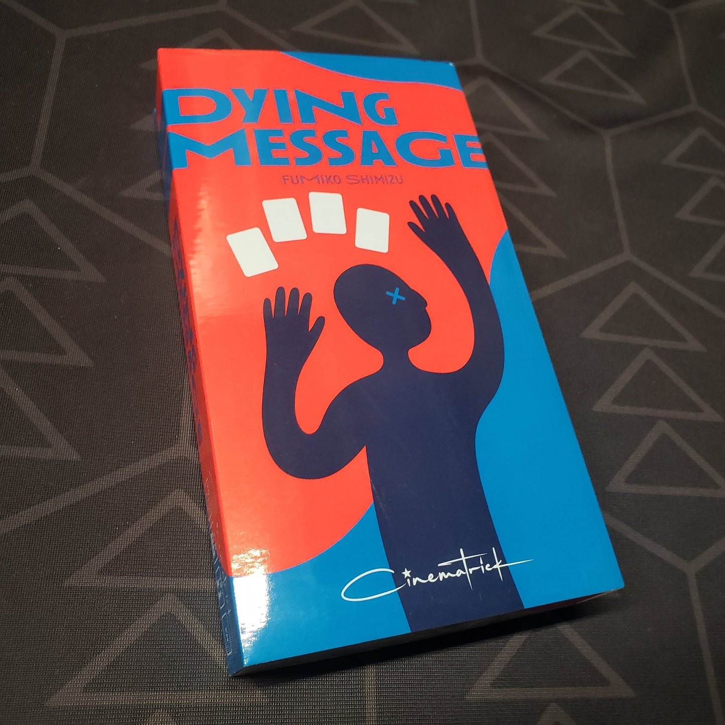 Image shows the front cover of the box for the Dying Message card game