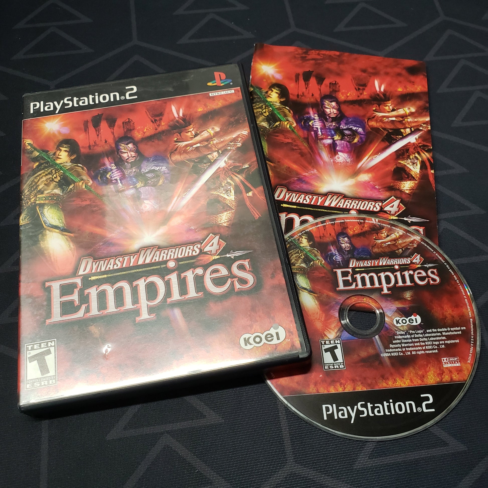 Image shows the case, manual and disc for the video game Dynasty Warriors 4: Empires for Playstation 2