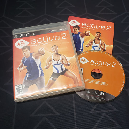 Image shows the case, manual and disc for the video game EA Sports Active 2 for Playstation 3