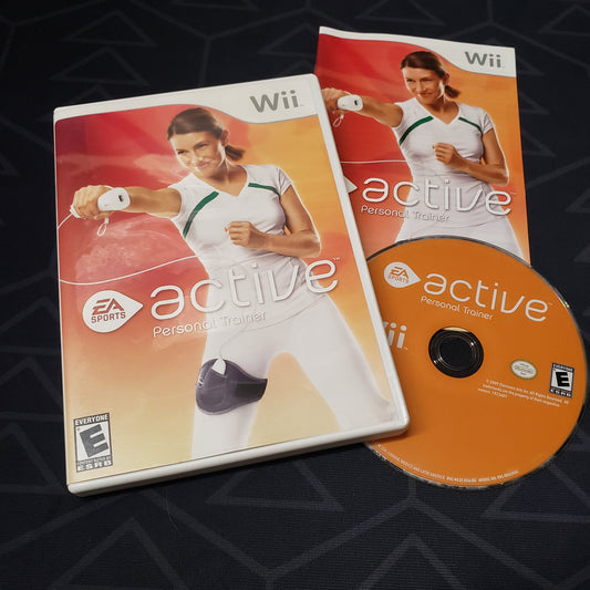 Image shows the case, manual and disc for the video game EA Sports Active for Nintendo Wii