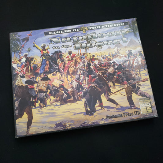 Image shows the front cover of the box of the Napoleon in the Desert board game