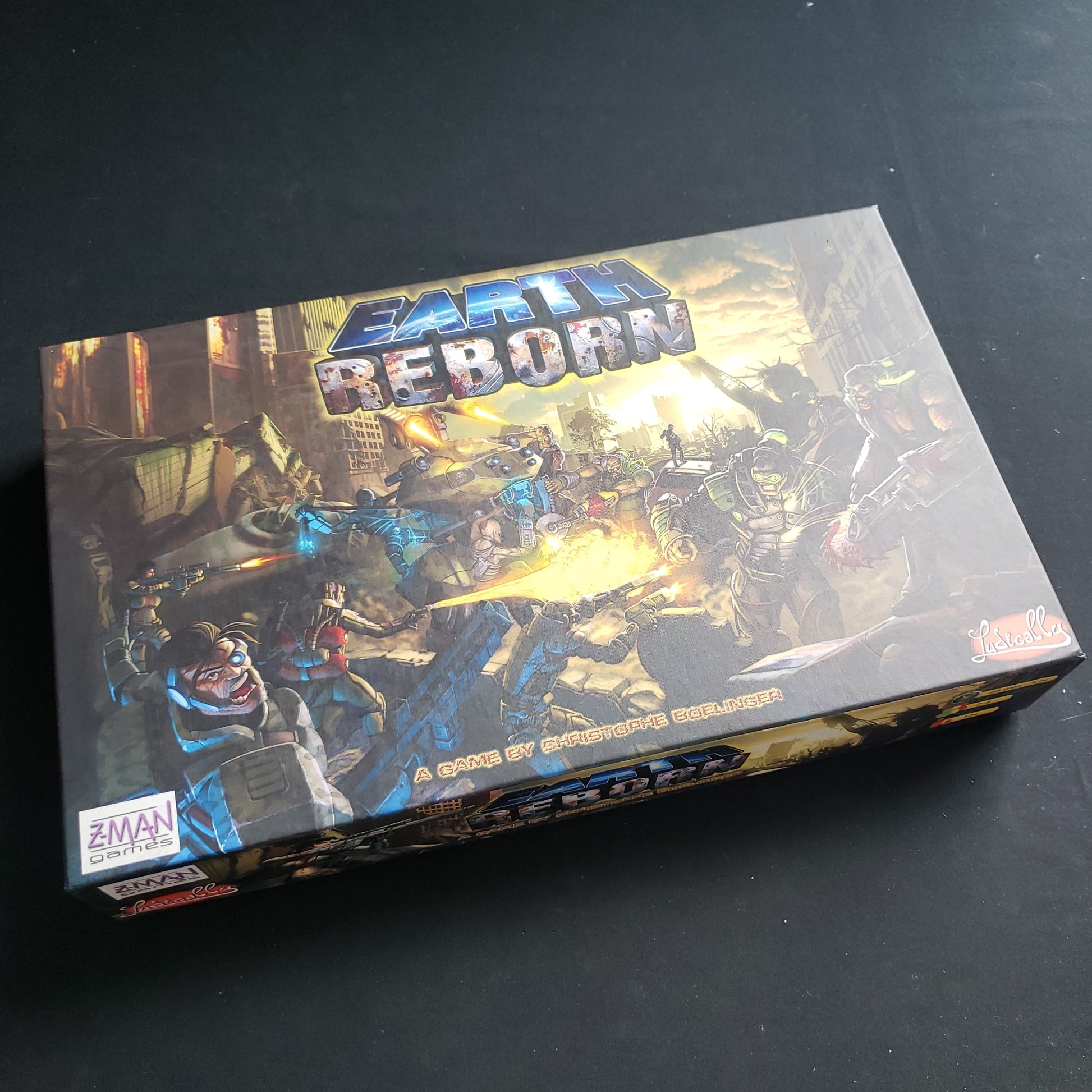 Image shows the front cover of the box of the Earth Reborn board game