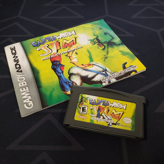 Image shows the manual & cartridge for the video game Earthworm Jim for Nintendo Game Boy Advance