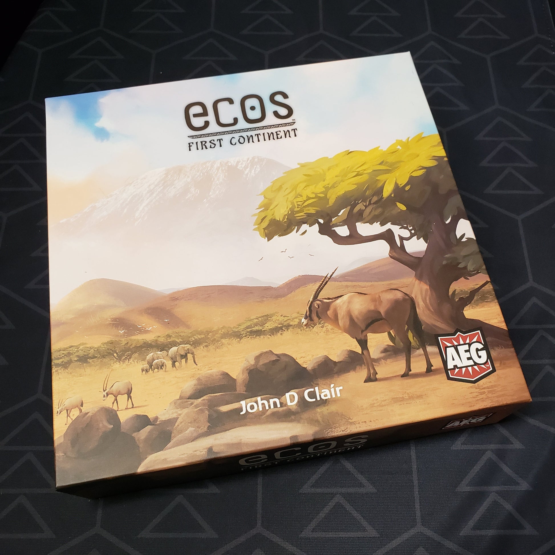 Image shows the front cover of the box of the Ecos: First Continent board game