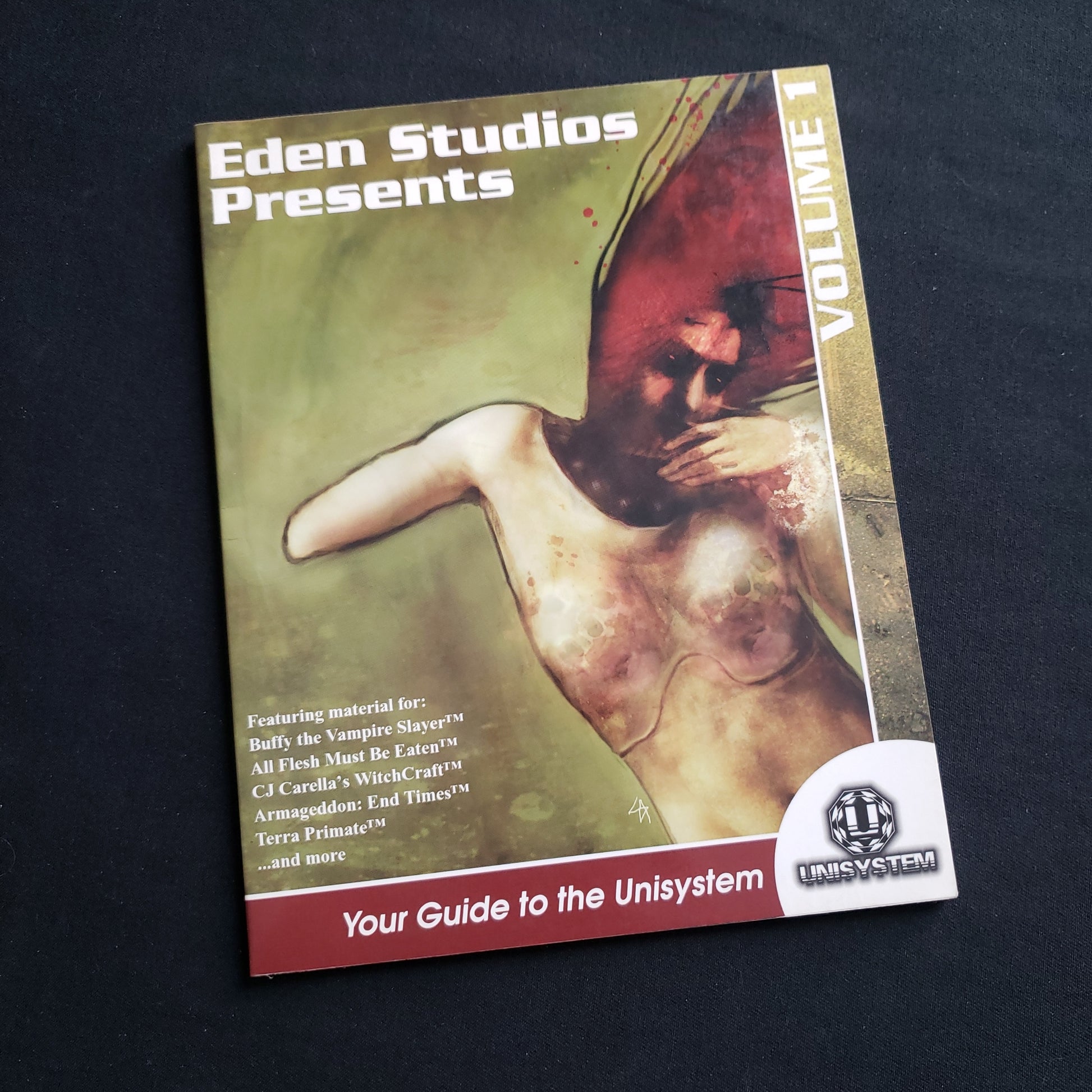Image shows the front cover of the Eden Studios Presents: Your Guide to the Unisystem Vol 1 roleplaying game book