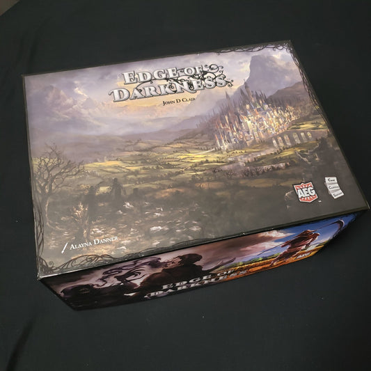 Image shows the front cover of the box of the Edge of Darkness board game