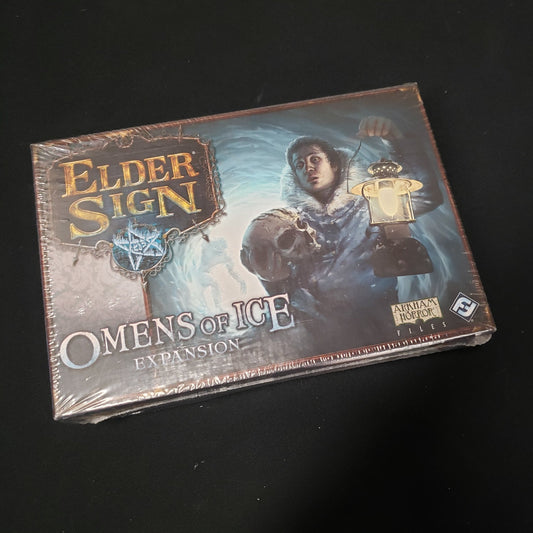Image shows the front cover of the box for the Omens of Ice expansion from the board game Elder Sign