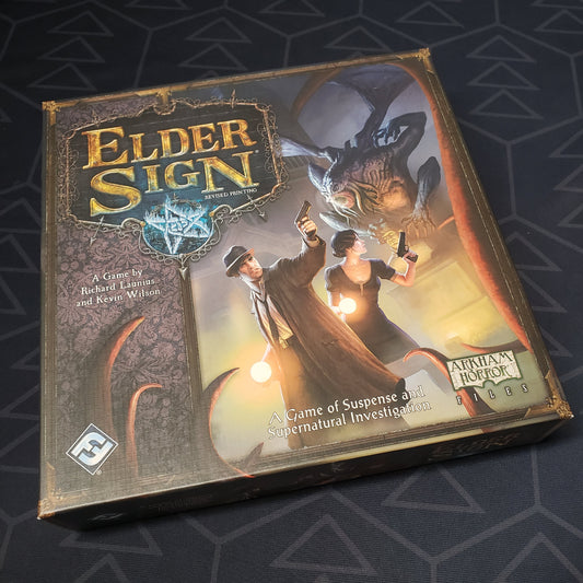 Image shows the front cover of the box of the Elder Sign board game