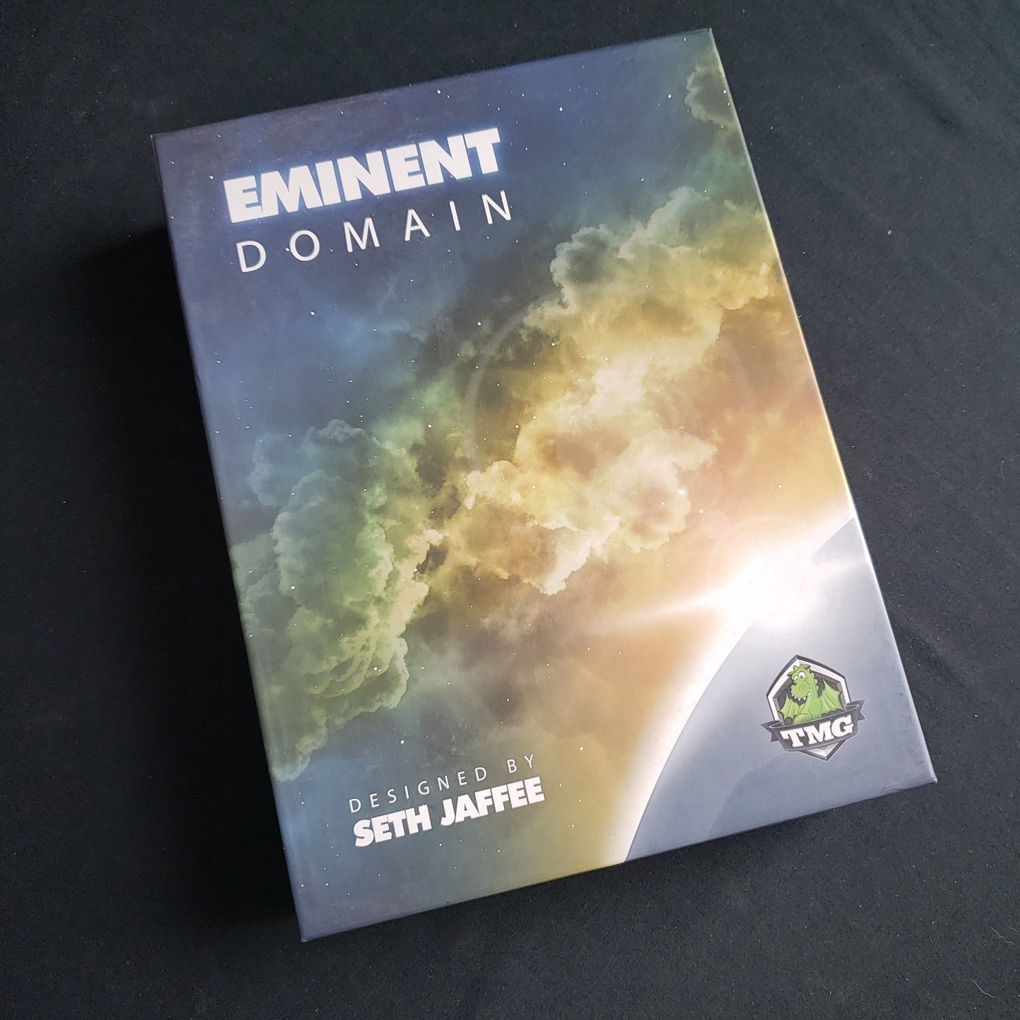 Image shows the front cover of the box of the Eminent Domain card game