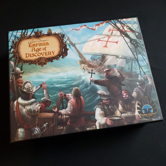 Image shows the front cover of the box of the Empires: Age of Discovery board game