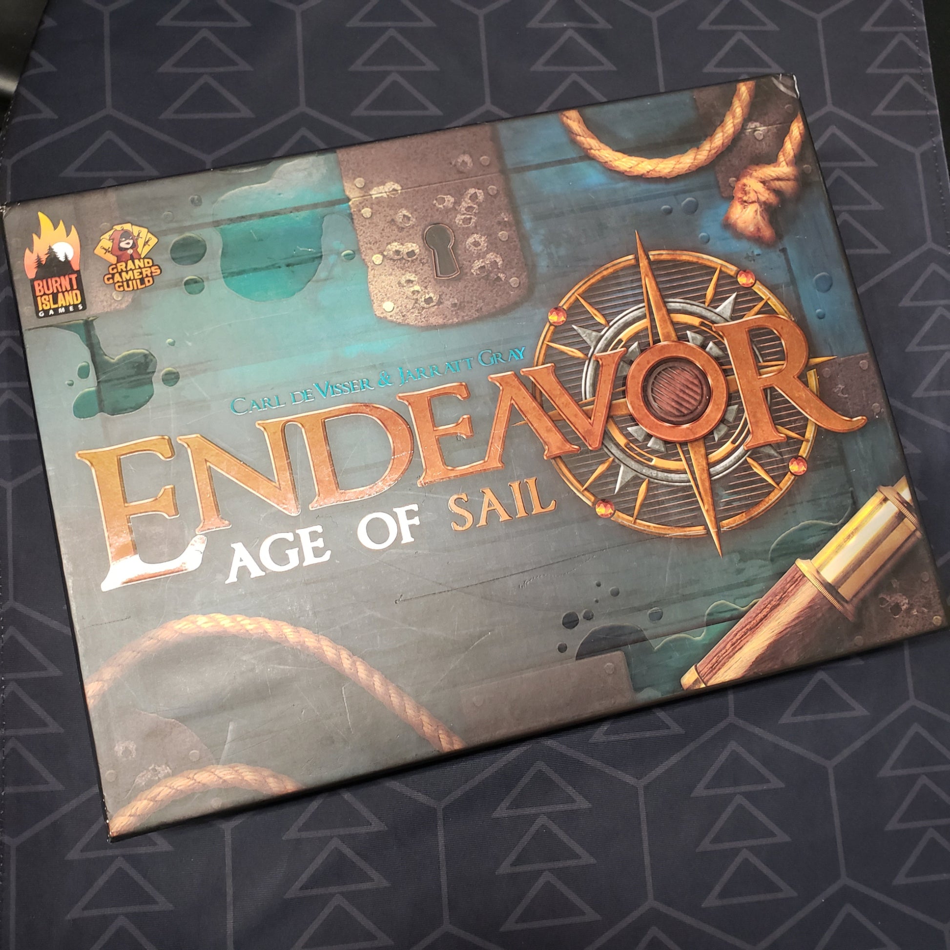 Image shows the front cover of the Kickstarter Edition box for the board game Endeavor: Age of Sail