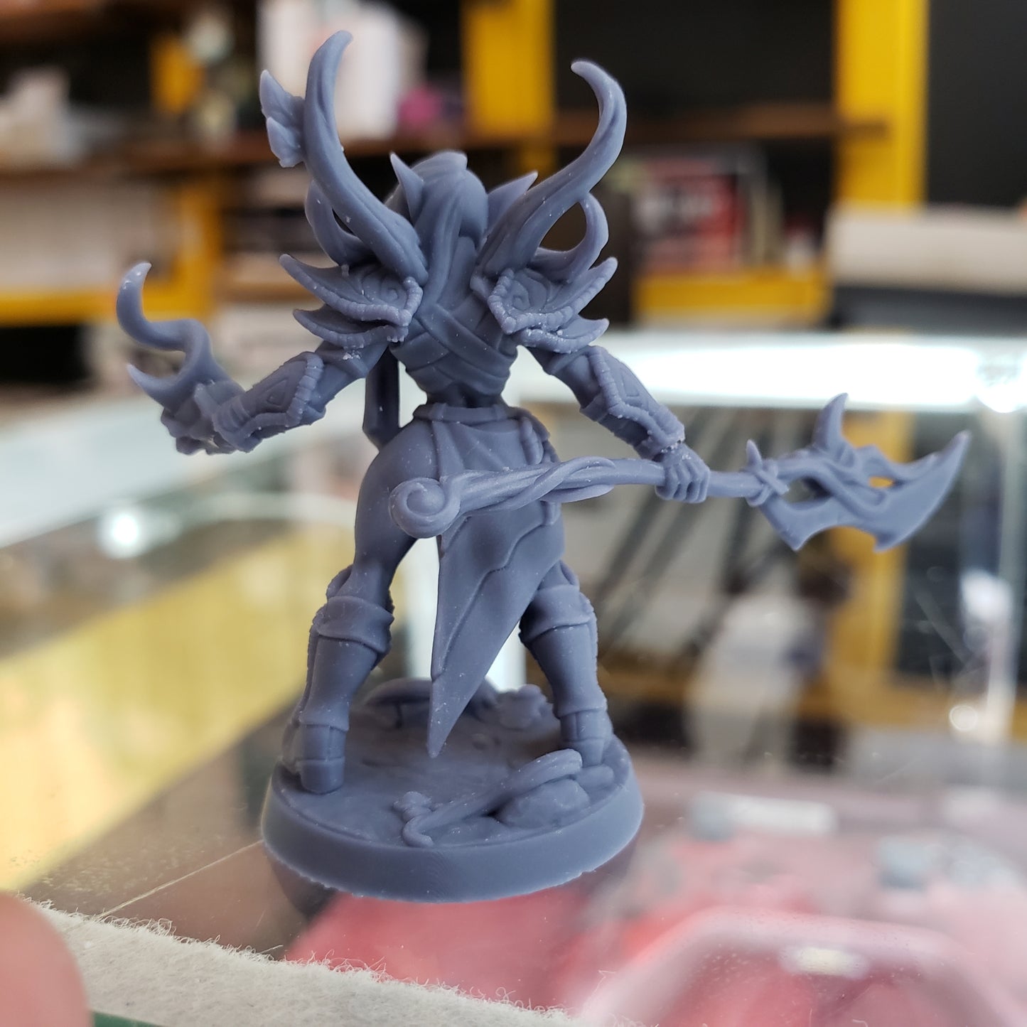 Image shows an example of a 3D printed elf warrior gaming miniature printed in-house at All Systems Go