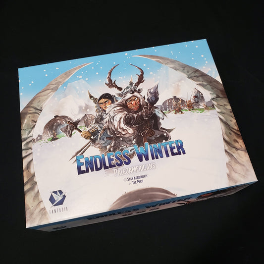 Image shows the front cover of the box of the Endless Winter: Paleoamericans board game