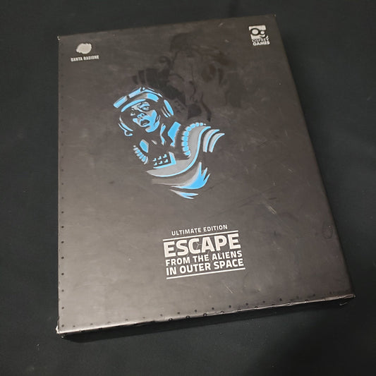 Image shows the front cover of the box of the board game Escape from the Aliens in Outer Space