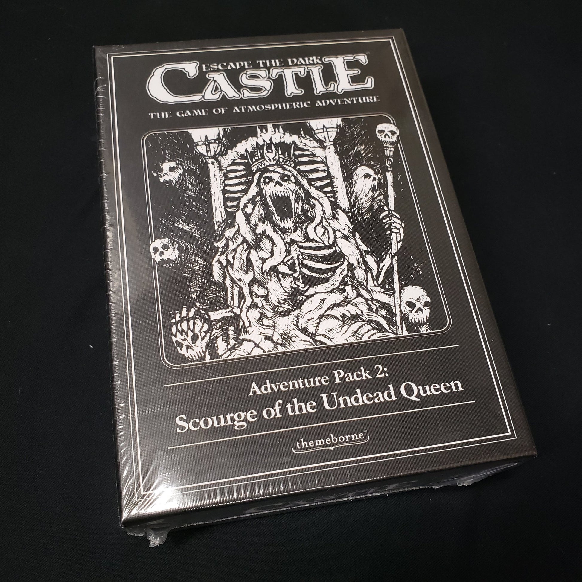 Image shows the front cover of the box for the Scourge of the Undead Queen expansion for the board game Escape the Dark Castle