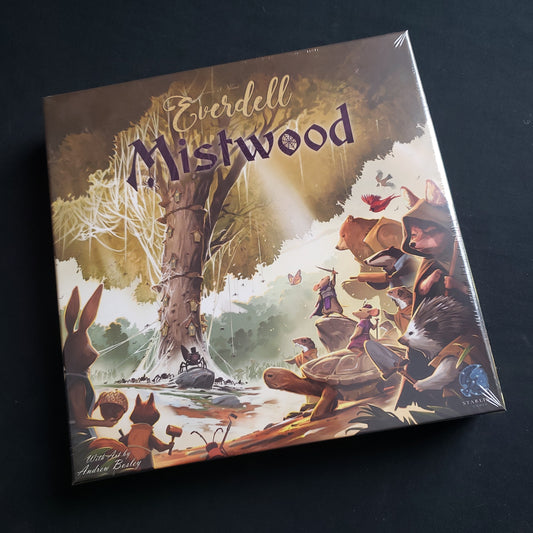 Image shows the front cover of the box of the Mistwood expansion for the board game Everdell