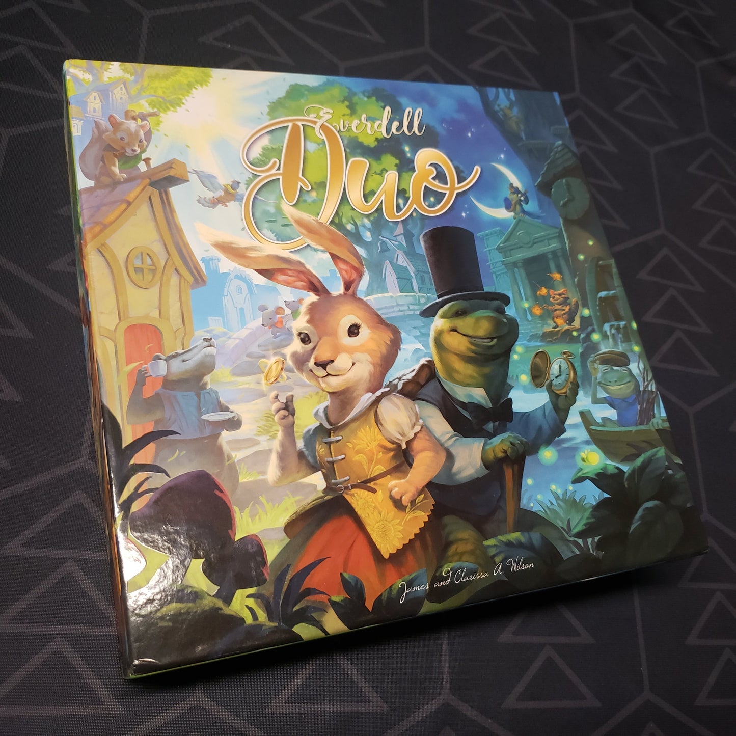 Image shows the front cover of the box for the Everdell Duo board game