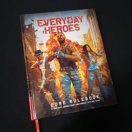 Image shows the front cover of the core rulebook for the Everyday Heroes roleplaying game